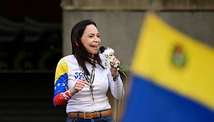 Maria Corina Machado celebrating Nobel Peace Prize win with Venezuelan supporters.